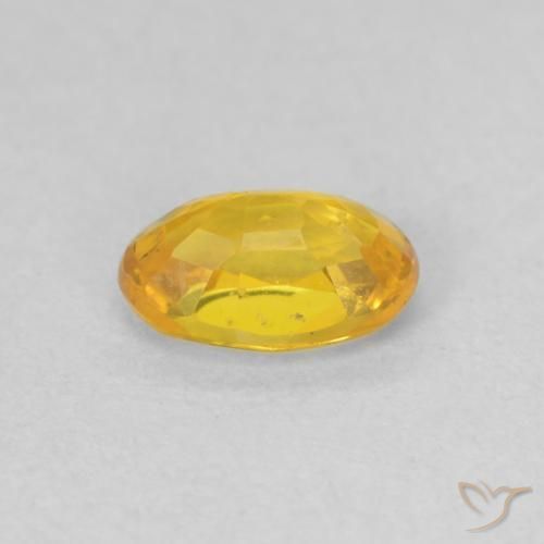 Zafiro Naranja dorado natural de 0.62 ct, Ovalada, VVS
