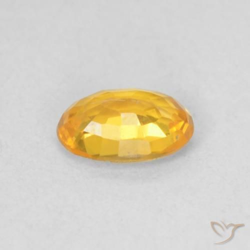 Zafiro Naranja medio natural de 0.56 ct, Ovalada, VVS-VS