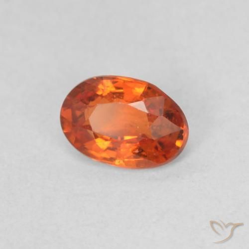 Zafiro Naranja rojizo natural de 0.54 ct, Ovalada, VVS