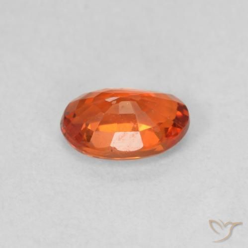 Zafiro Naranja rojizo natural de 0.54 ct, Ovalada, VVS