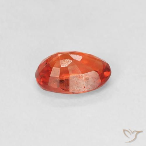 Zafiro Naranja rojizo natural de 0.63 ct, Ovalada, VVS-VS