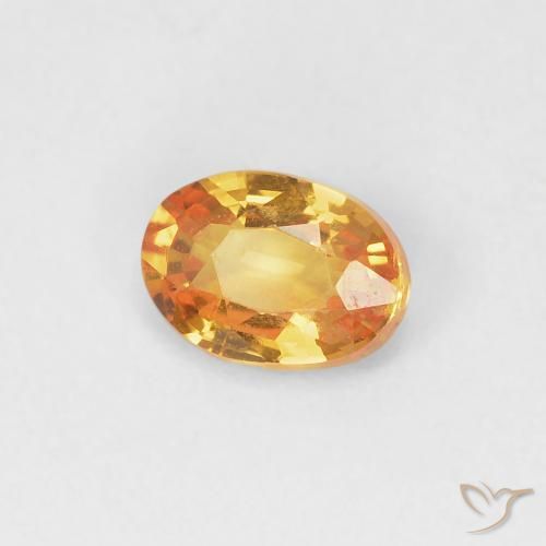 Zafiro Dorado naranja natural de 0.55 ct, Ovalada, VVS-VS