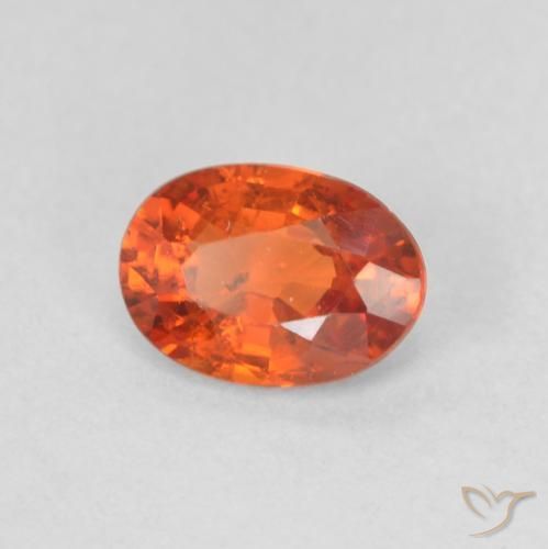 Zafiro Naranja rojizo natural de 0.55 ct, Ovalada, VS