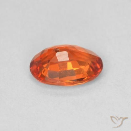 Zafiro Naranja rojizo natural de 0.55 ct, Ovalada, VS