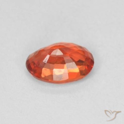 Zafiro Naranja rojizo natural de 0.55 ct, Ovalada, VVS-VS