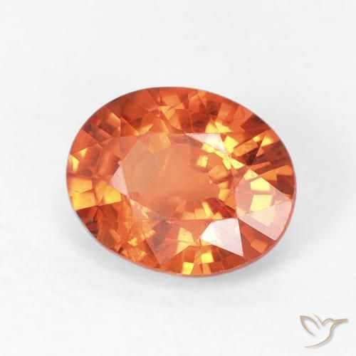 Zafiro Naranja fuego natural de 0.77 ct, Ovalada, VS