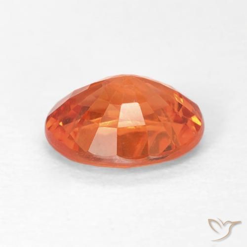 Zafiro Naranja fuego natural de 0.77 ct, Ovalada, VS