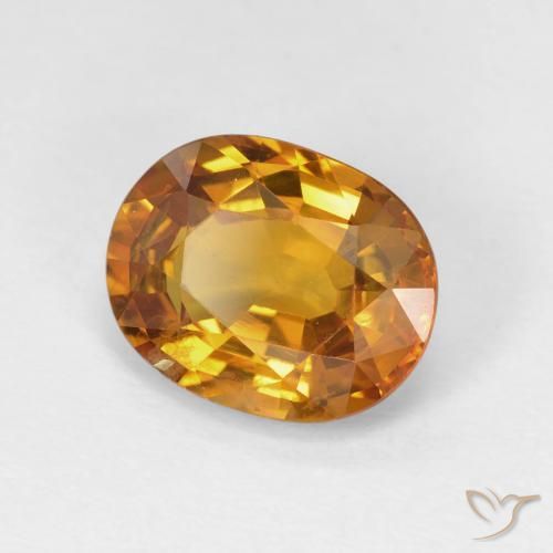 Zafiro Naranja oscuro natural de 4.33 ct, Ovalada, VS