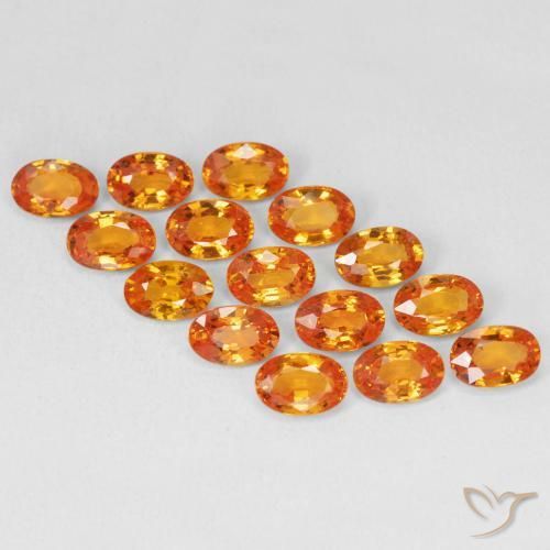 Zafiro Ámbar naranja natural de 0.66 ct, Ovalada, VVS-VS