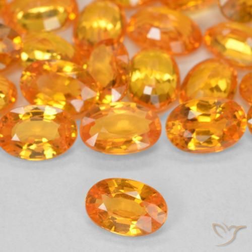 Zafiro Naranja claro natural de 0.60 ct, Ovalada, VVS-VS