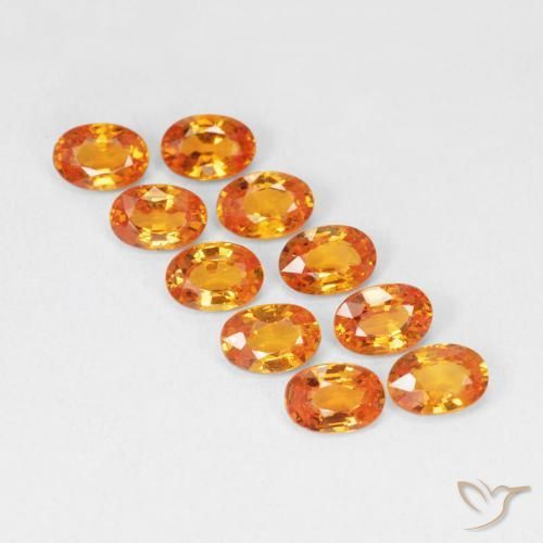 Zafiro Naranja medio natural de 0.56 ct, Ovalada, VVS-VS