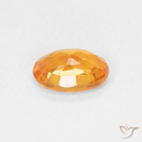 Zafiro Naranja claro natural de 0.60 ct, Ovalada, VS