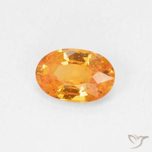 Zafiro Naranja intenso natural de 0.60 ct, Ovalada, VS