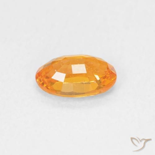 Zafiro Naranja intenso natural de 0.60 ct, Ovalada, VS