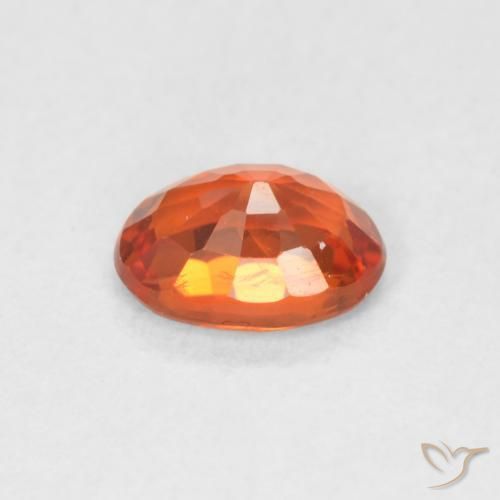 Zafiro Naranja rojizo natural de 0.67 ct, Ovalada, VVS-VS