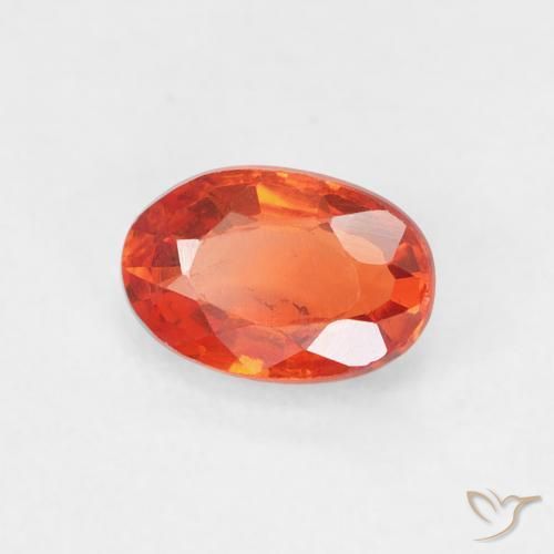 Zafiro Naranja rojizo natural de 0.69 ct, Ovalada, VS