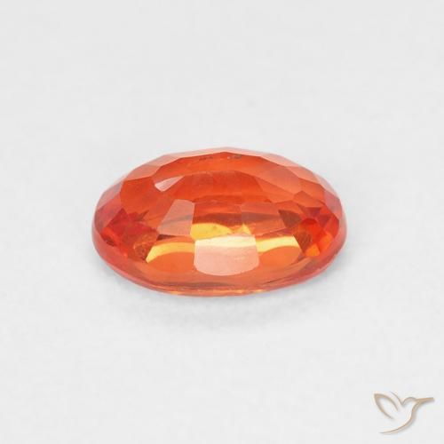 Zafiro Naranja rojizo natural de 0.69 ct, Ovalada, VS