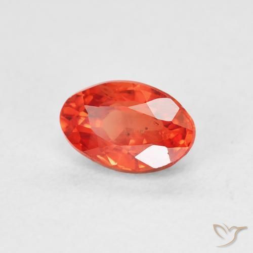 Zafiro Naranja rojizo natural de 0.68 ct, Ovalada, VS
