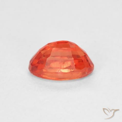 Zafiro Naranja rojizo natural de 0.68 ct, Ovalada, VS