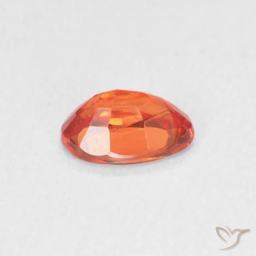 Zafiro Naranja rojizo natural de 0.54 ct, Ovalada, VVS-VS
