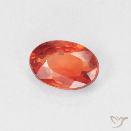 Zafiro Naranja rojizo natural de 0.70 ct, Ovalada, VVS-VS