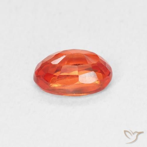 Zafiro Naranja rojizo natural de 0.70 ct, Ovalada, VVS-VS