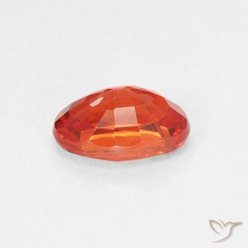 Zafiro Naranja medio natural de 0.64 ct, Ovalada, VS