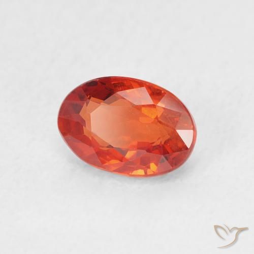 Zafiro Naranja rojizo natural de 0.76 ct, Ovalada, VS