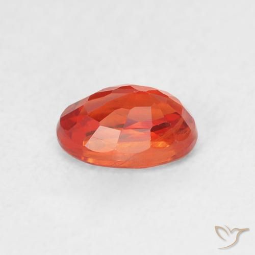 Zafiro Naranja rojizo natural de 0.76 ct, Ovalada, VS