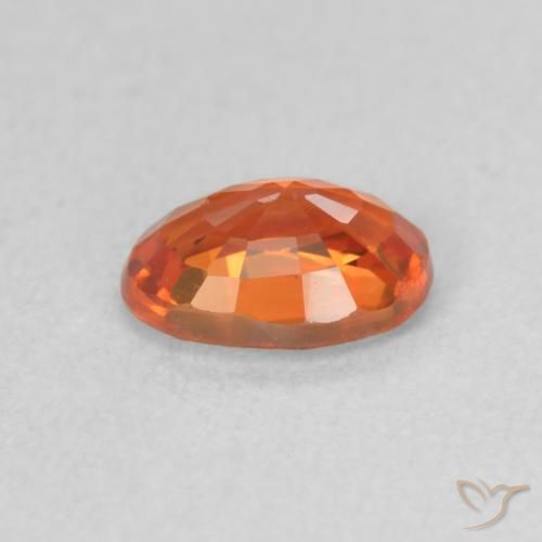 Zafiro Naranja medio natural de 0.71 ct, Ovalada, VVS-VS