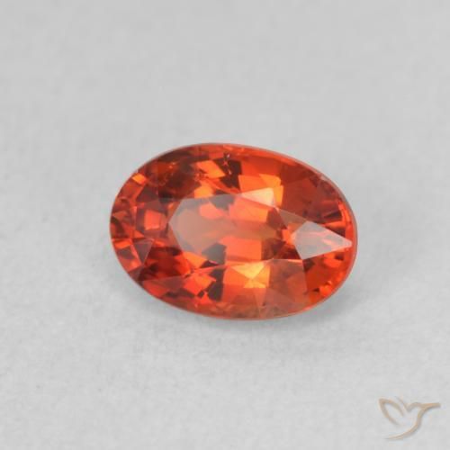 Zafiro Rojo ámbar oscuro natural de 0.73 ct, Ovalada, VVS-VS
