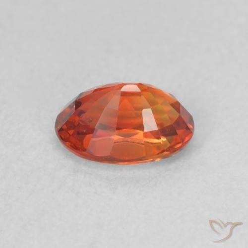 Zafiro Rojo ámbar oscuro natural de 0.73 ct, Ovalada, VVS-VS