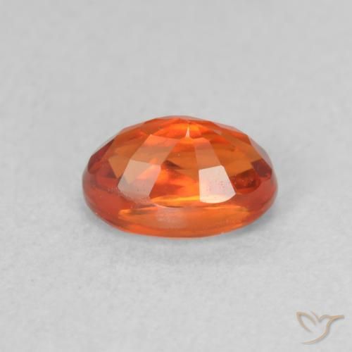 Zafiro Naranja rojizo natural de 0.84 ct, Ovalada, VVS-VS