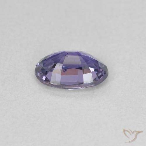Zafiro Púrpura azulado oscuro natural de 0.56 ct, Ovalada, VS