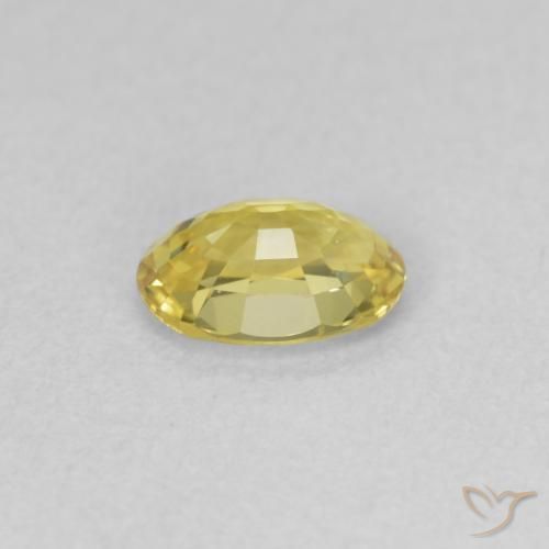 Zafiro Dorado claro natural de 0.54 ct, Ovalada, VVS