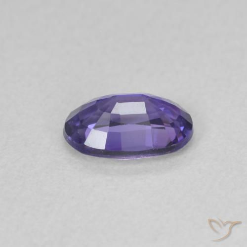 Zafiro Púrpura oscuro natural de 0.65 ct, Ovalada, VVS