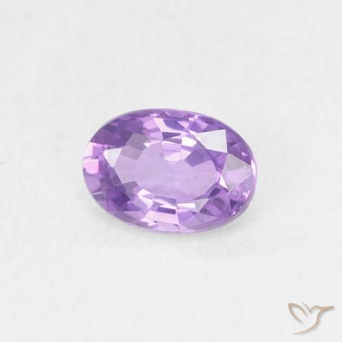 Zafiro Violeta rosado medio natural de 0.58 ct, Ovalada, VS