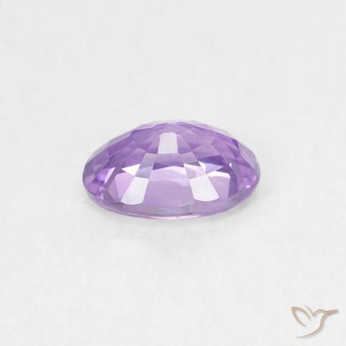 Zafiro Violeta rosado medio natural de 0.58 ct, Ovalada, VS