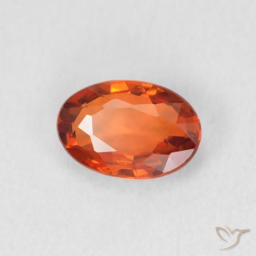 Zafiro Naranja rojizo natural de 0.64 ct, Ovalada, VVS