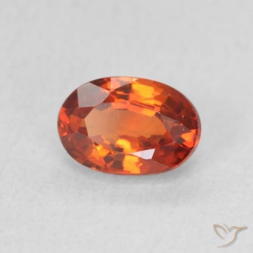 Zafiro Naranja rojizo natural de 0.78 ct, Ovalada, VVS