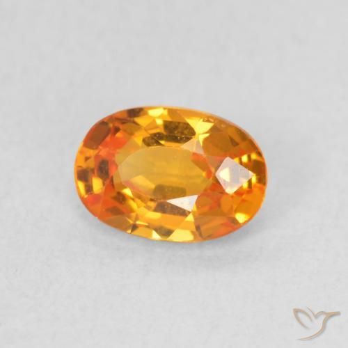 Zafiro Naranja claro natural de 0.64 ct, Ovalada, VVS