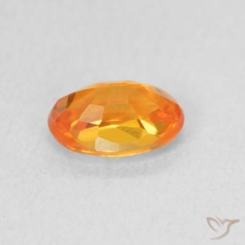 Zafiro Naranja claro natural de 0.64 ct, Ovalada, VVS