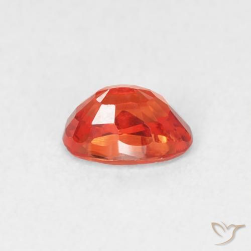 Zafiro Naranja medio natural de 0.68 ct, Ovalada, VS