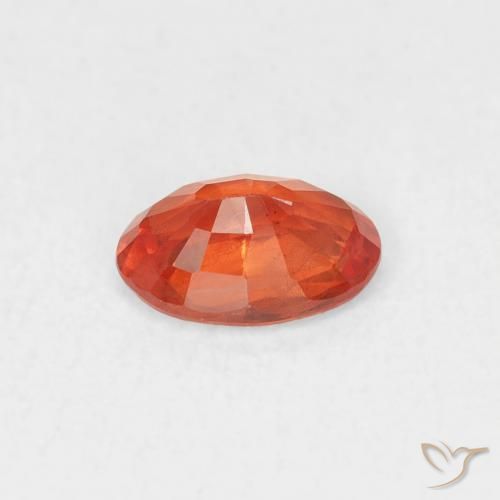 Zafiro Ámbar naranja natural de 0.54 ct, Ovalada, VS