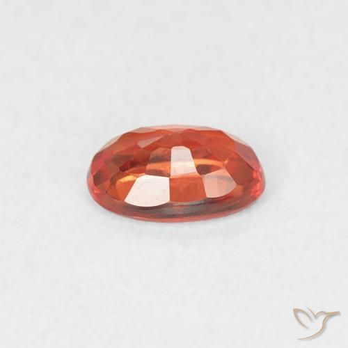 Zafiro Naranja medio natural de 0.56 ct, Ovalada, VVS-VS