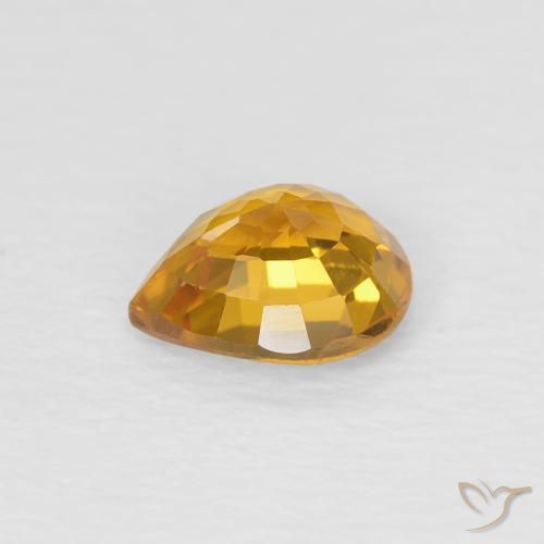 Zafiro Dorado naranja natural de 0.79 ct, En forma de pera, VVS-VS