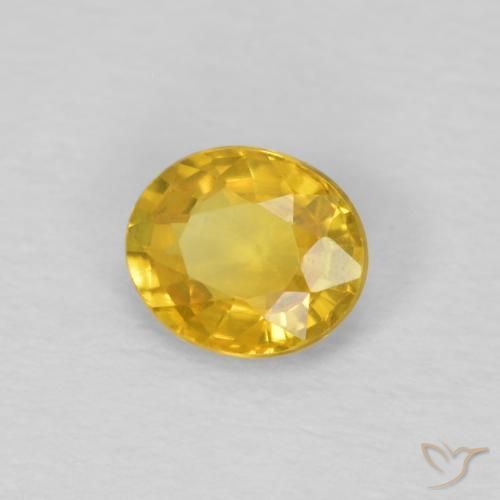 Zafiro Dorado medio natural de 0.55 ct, Ovalada, VVS-VS
