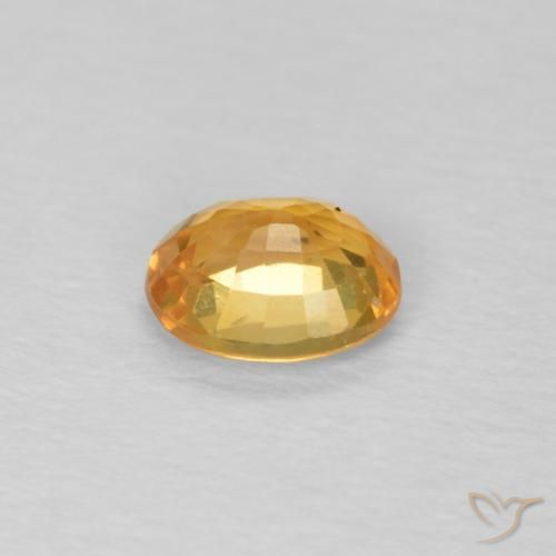 Zafiro Dorado naranja natural de 0.51 ct, Ovalada, VVS-VS