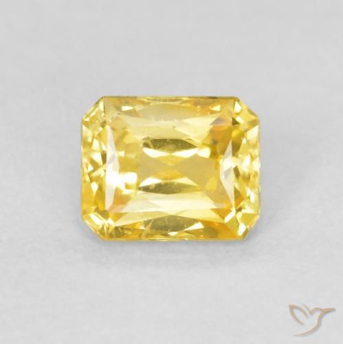 0.56ct Natural Amarillo medio Zafiro, corte esmeralda, VS