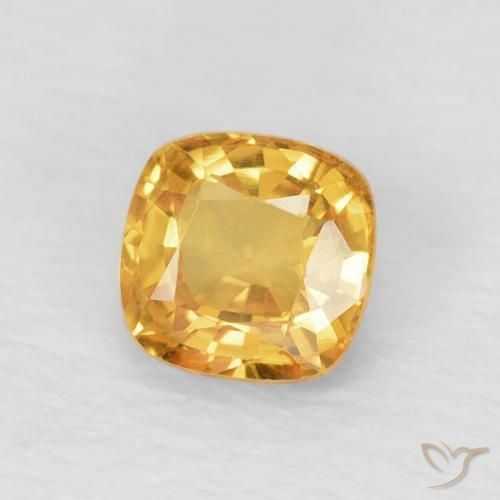 Zafiro Naranja dorado intenso natural de 0.63 ct, Forma Cojín, VVS